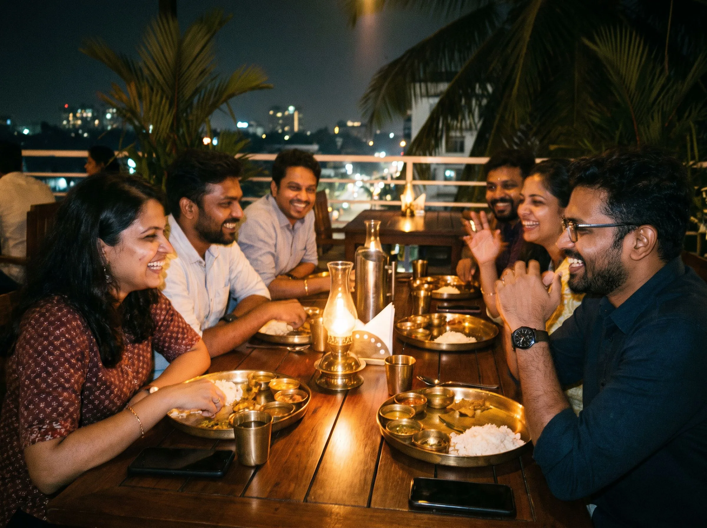 Friends mid-laugh at a rooftop